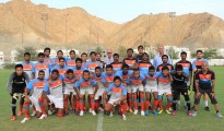 National Coach Wim Koevermans and Technical Director Rob Baan pose with the U-22 squad in Muscat.