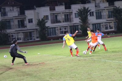An agile Subrata Pal (left) keeps a close watch during a practice session at the Choa Chu Kang Stadium.