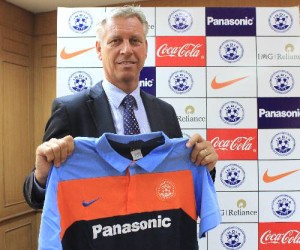 Wim Koevermans poses with the Indian National Football Team colours.