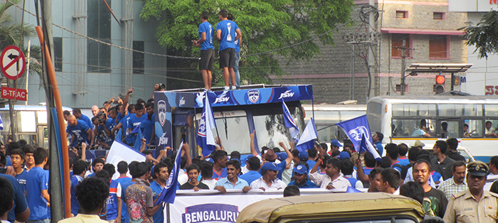 BFC players dancing at the top of the bus