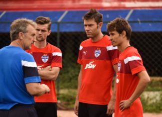 Coach Albert Roca with Cameron Watson, Juan Gonzalez and Alvaro Rubio